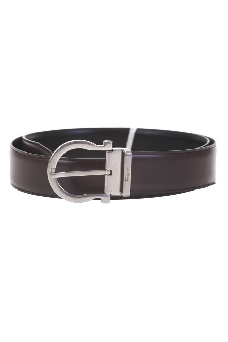 Shop SALVATORE FERRAGAMO  Cintura: Salvatore Ferragamo cintura reversibile e regolabile Gancini.
Reversibile.
Bicolore.
Asta cucita, realizzata in vitello dalla grana sottile e naturale.
Fibbia dal profilo piatto e dalla silhouette Gancini in finitura palladio invecchiato.
Per ottenere la vestibilità desiderata, tagliare l'asta della cintura o aggiungere i fori necessari.
Altezza 3,5 cm.
Composizione: 100% pelle di vitello.
Fabbricato in Italia.. 679781 DOUBLE-033759073MARRONE/N